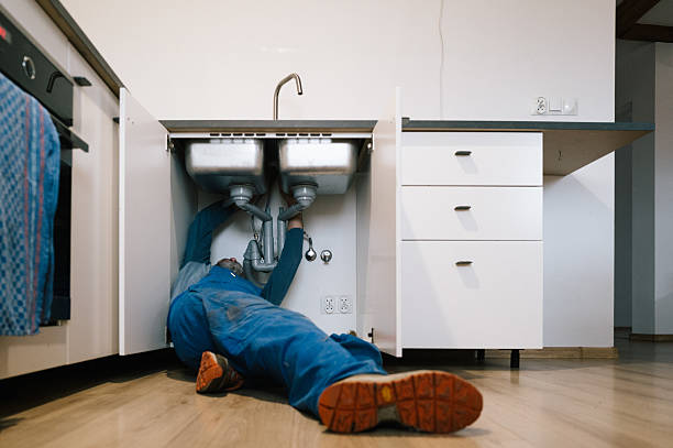 Professional Drain Cleaning technician working in Macdona, TX